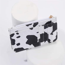White cow ID card holder