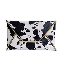 Cow print clutch